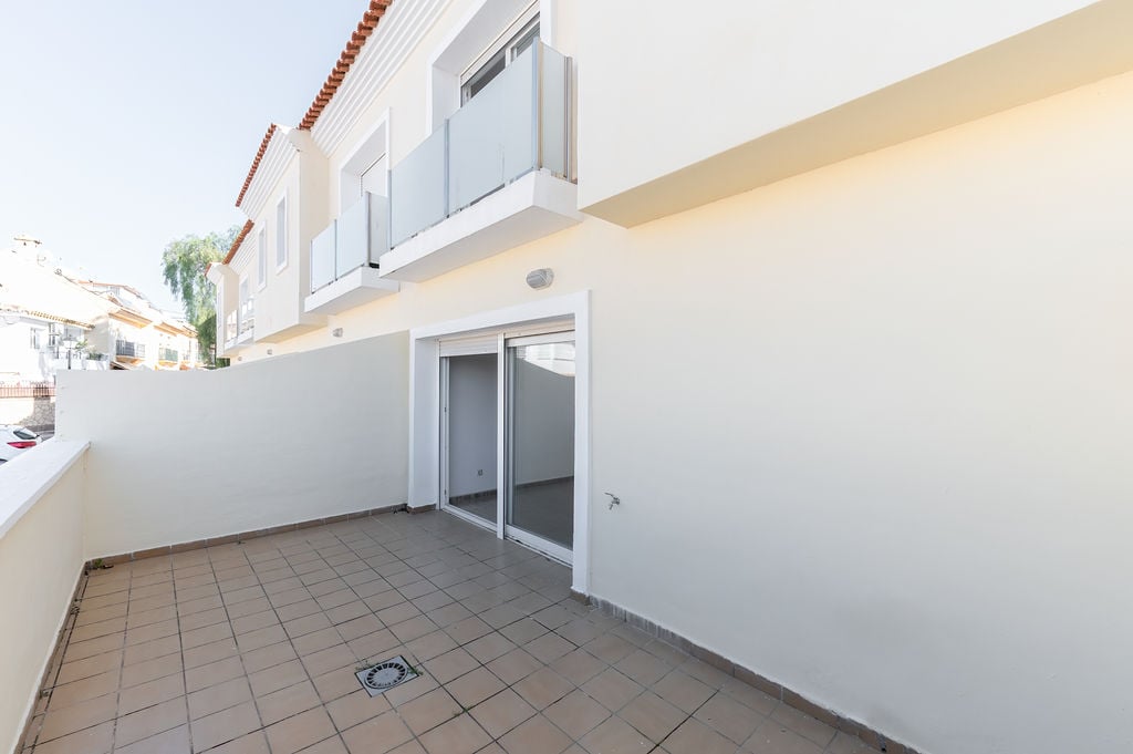 Chalet adosado en venta en calle Manolete